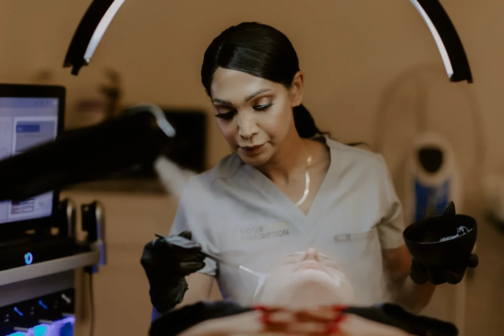 A woman is performing one of the best facials at her Med Spa near McCandless, PA