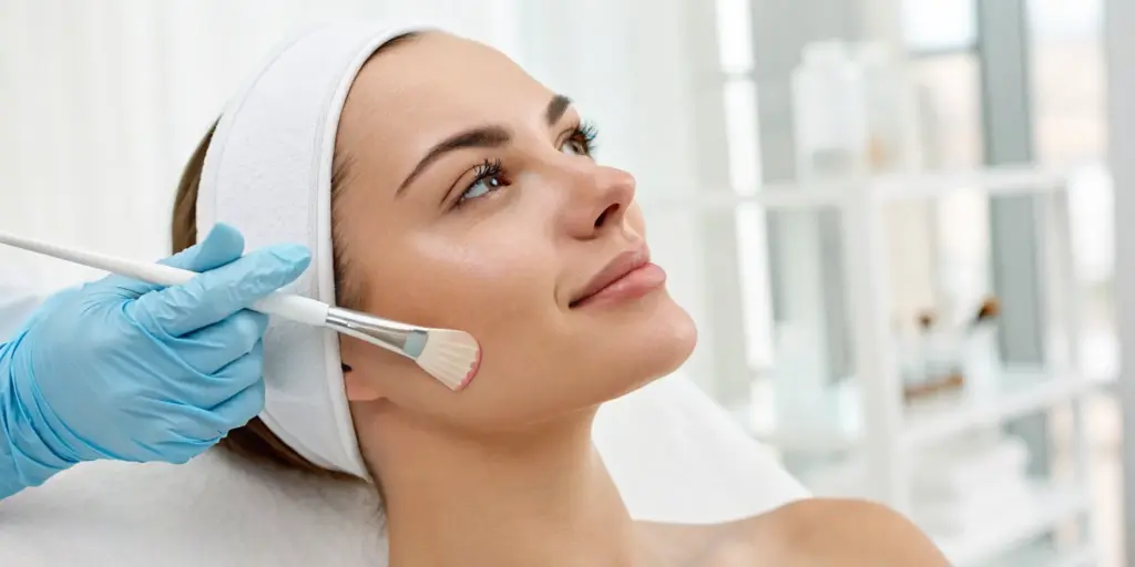 The benefits of a chemical peel on a woman's skin during treatment.